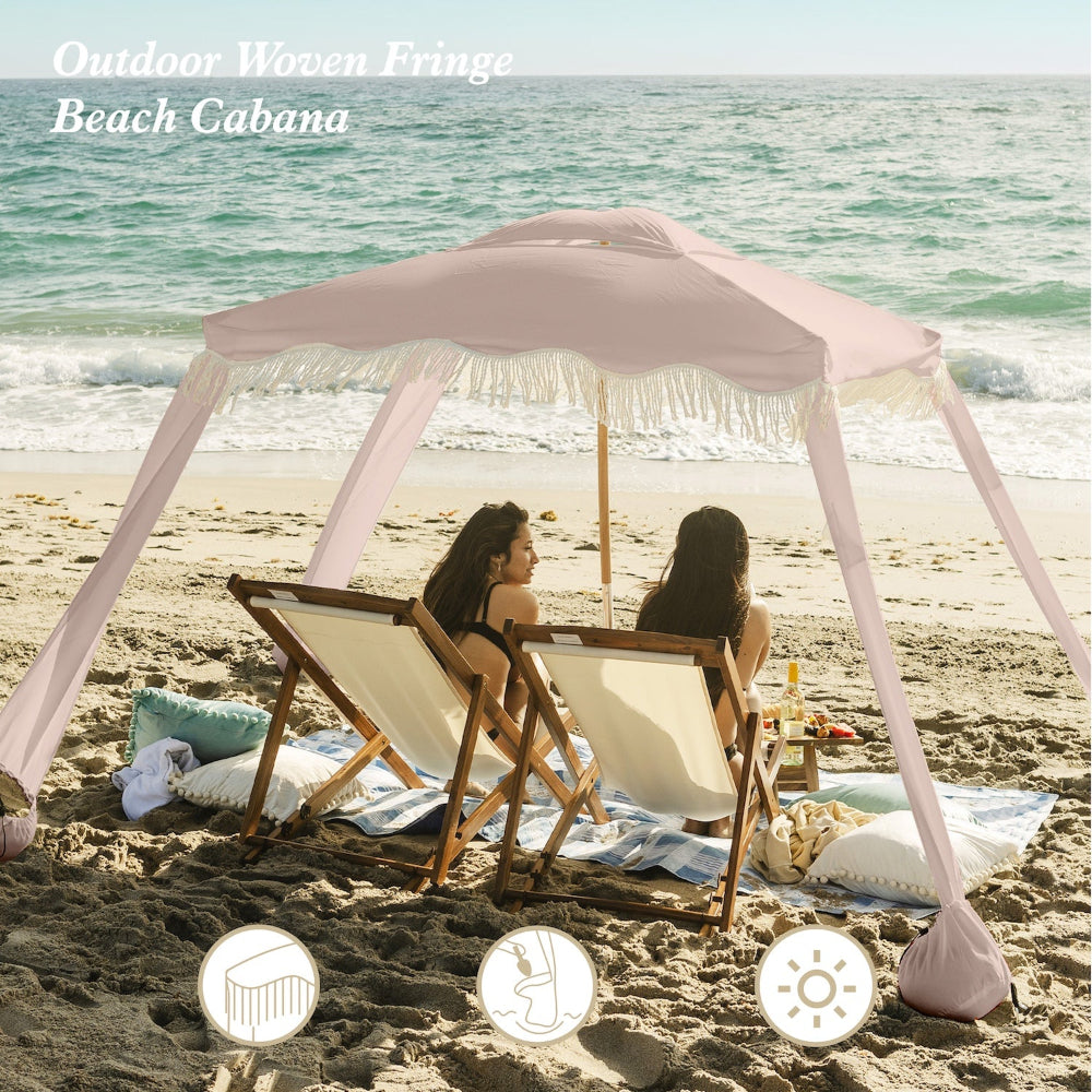 Two women sitting under an AMMSUN 7ftx7ft Pink Coral cabana beach tent with white fringe on beach