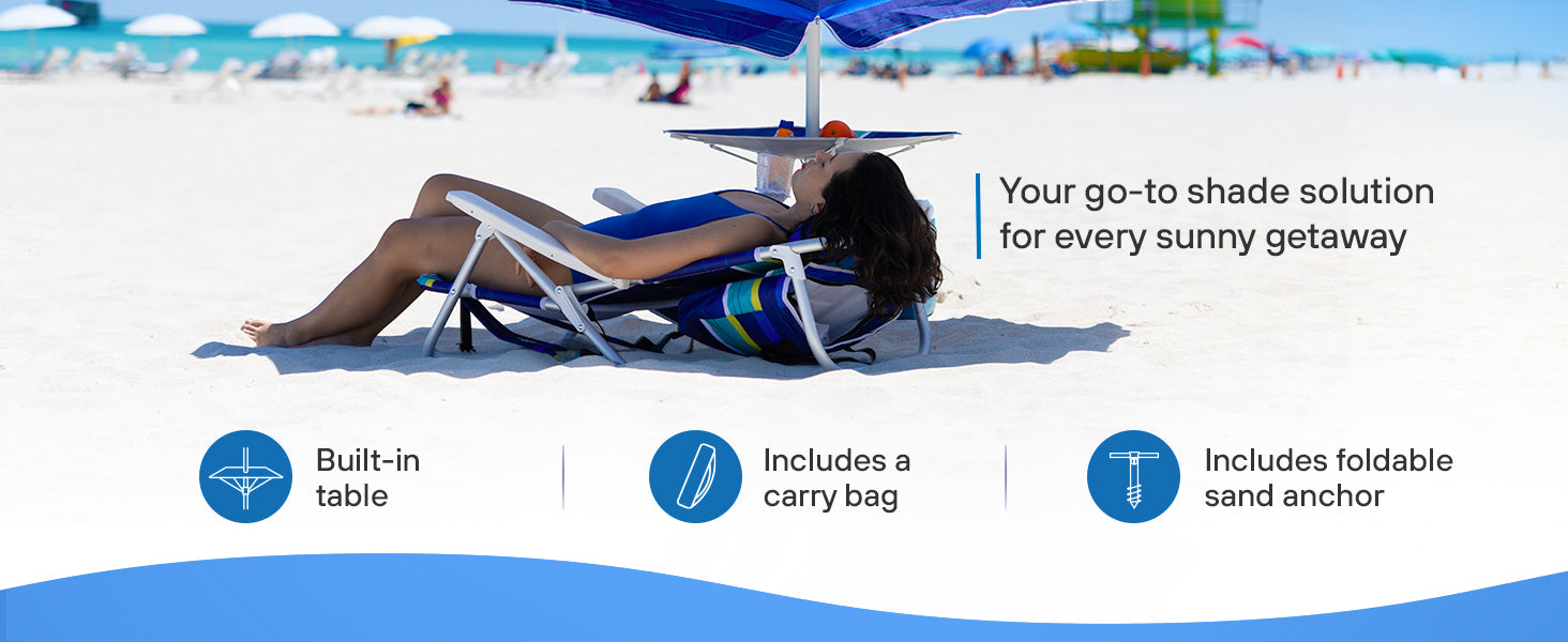 A woman lying under an AMMSUN 7ft blue stripes  beach umbrellas for sand heavy duty wind portable with table tray