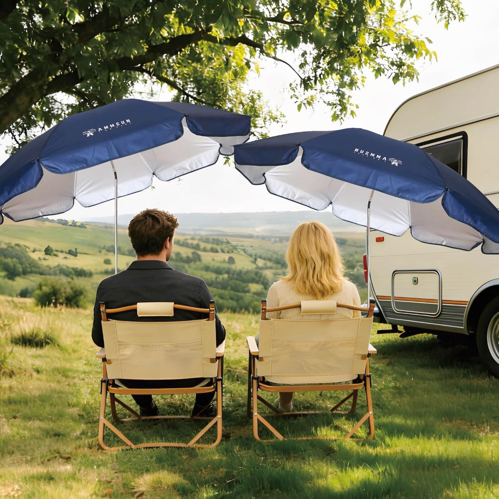 Two people sitting on two chairs with two AMMSUN navy blue outdoor umbrellas with clamp for beach chair, golfcart