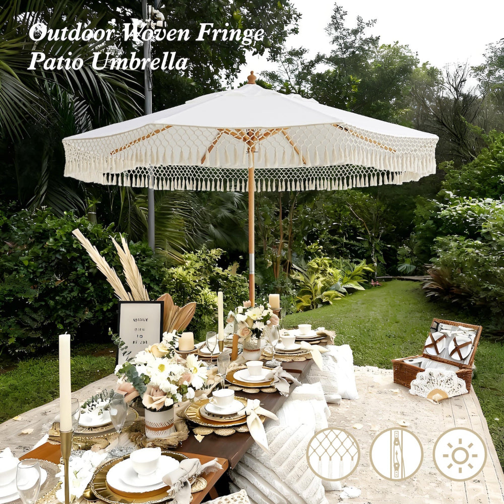 Outdoor setting with an AMMSUN 8.5ft woven fringe patio umbrella wood handle umbrellas for a meal.