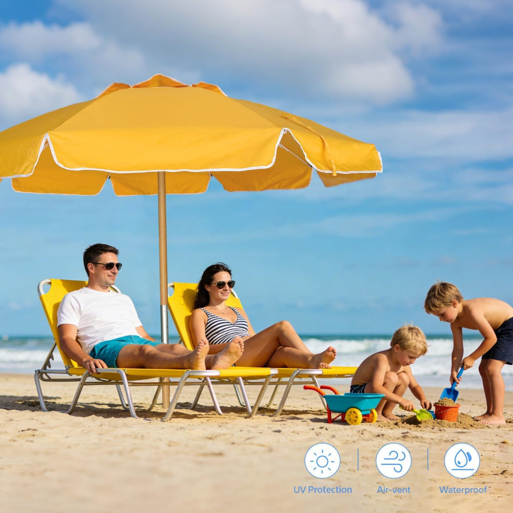 Family on a beach with AMMSUN 7.5ft yellow commercial grade beach umbrellas for sand on beach