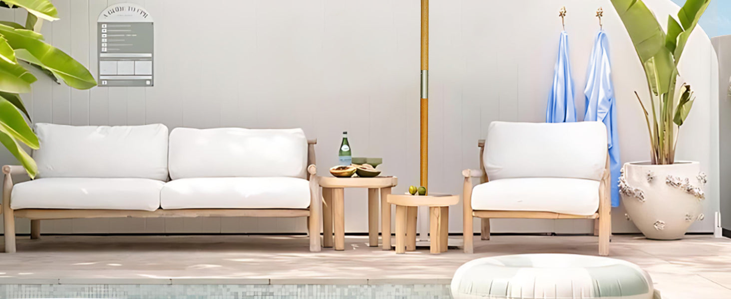 A white outdoor furniture set featuring a chair and an ottoman, both designed for comfort and style in an outdoor setting.