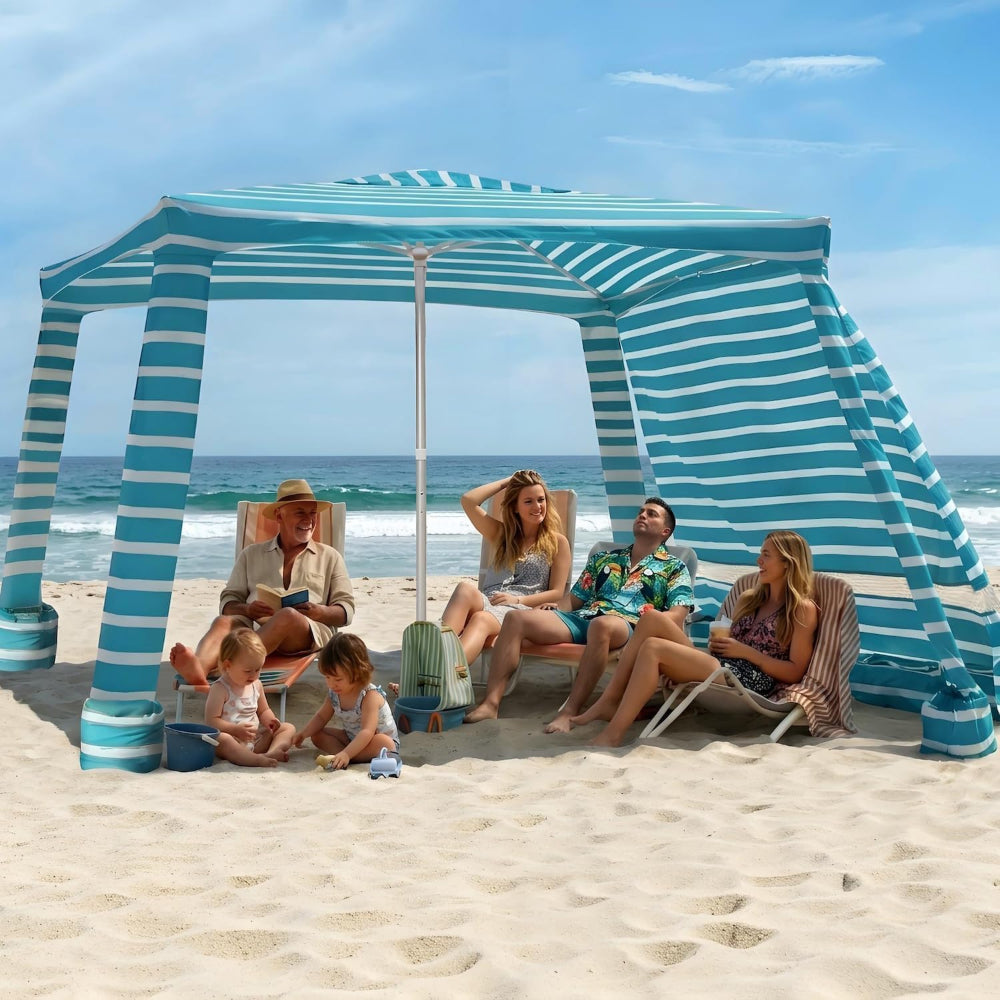 4 adults and 2 kids relaxing under an AMMSUN green stripes cool cabana beach tent with sun wall on beach