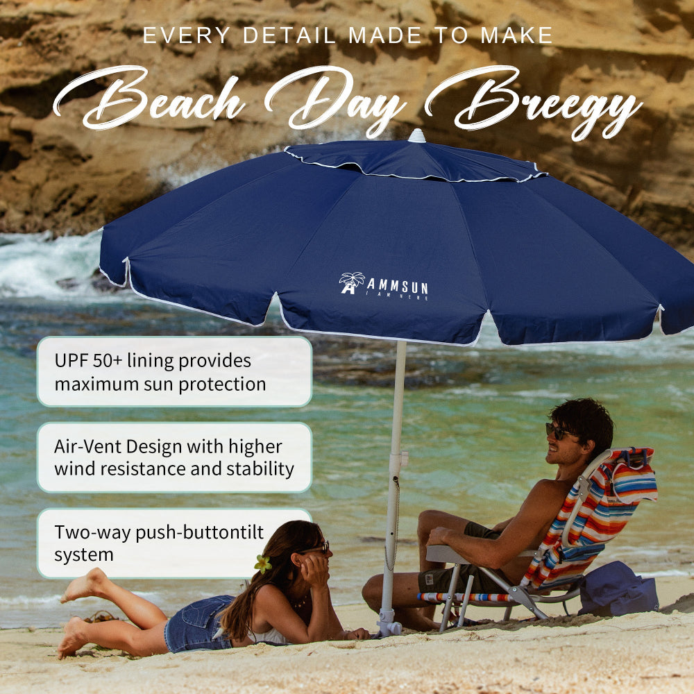 A couple shares a peaceful moment under an AMMSUN navy blue 8ft portable beach umbrella with sand anchor on the beach