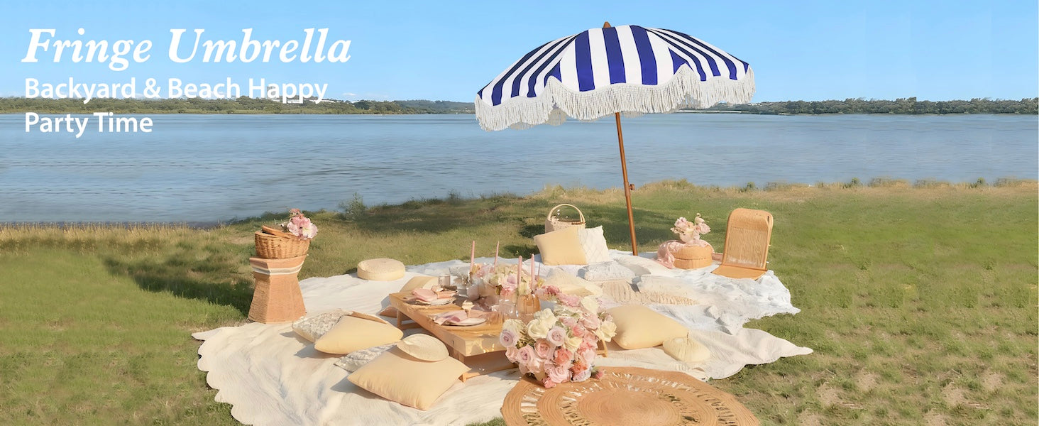  AMMSUN navy stripe fringe umbrella outdoor patio over a picnic setup by lake