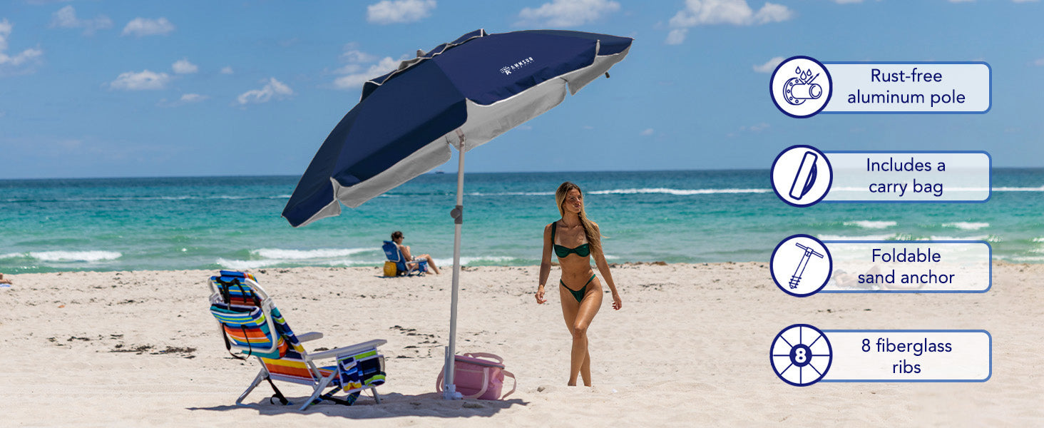 A woman relaxing under AMMSUN 7ft beach umbrella portable with sand anchor and ai-vent