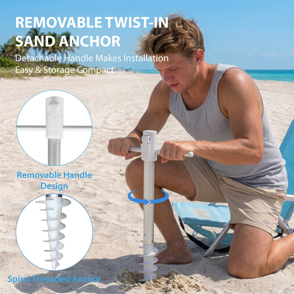 A man kneeling on a sandy beach demonstrates a white twist-in sand anchor with a detachable handle for umbrella for beach