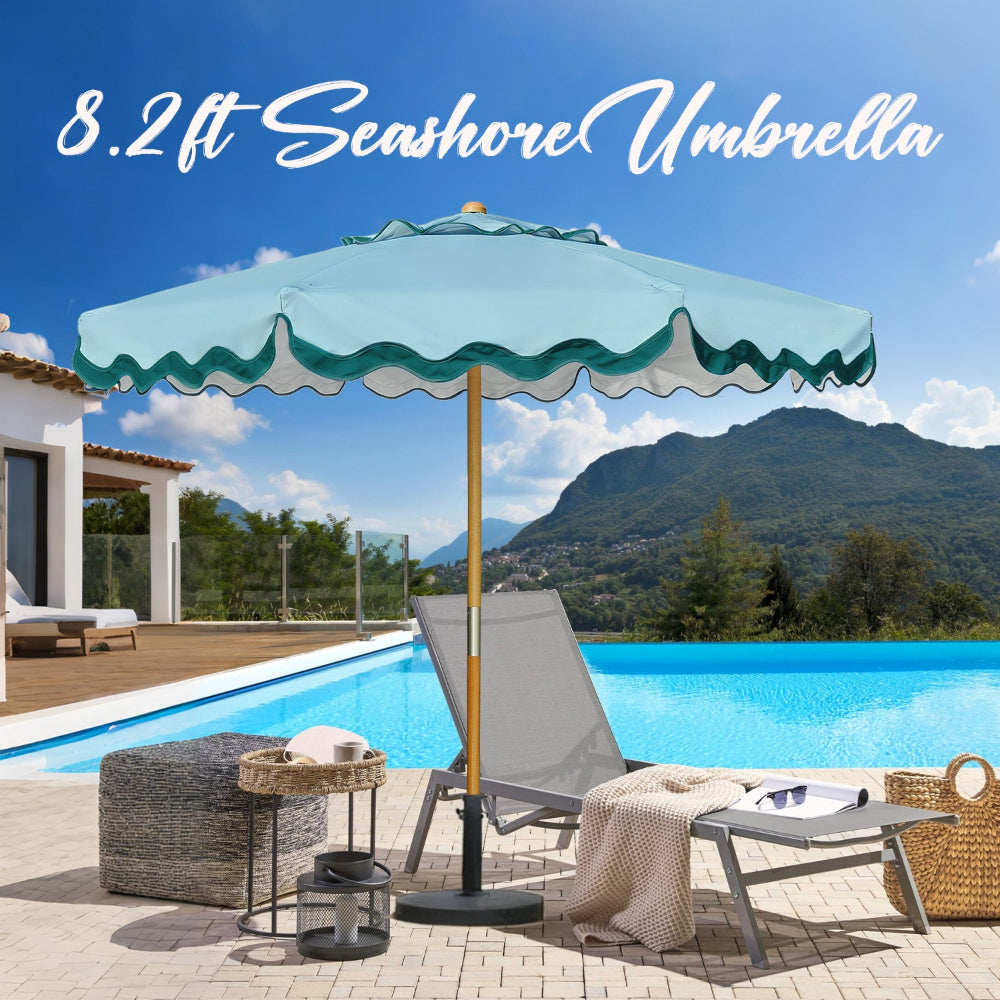 An 8 ft seashell umbrella outdoor patio with pulley lift is providing shade by poolside