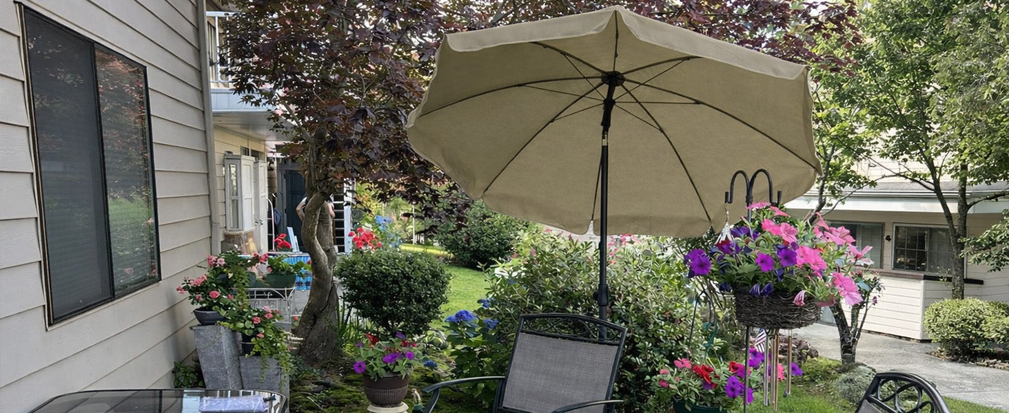 AMMSUN 6.5ft beige patio table umbrella made of uv blocking providing shade on garden