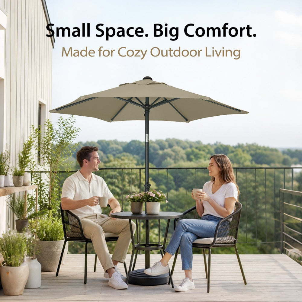 Two people sitting in a chic balcony with an AMMSUN 6ft khaki best choice patio umbrella for outside