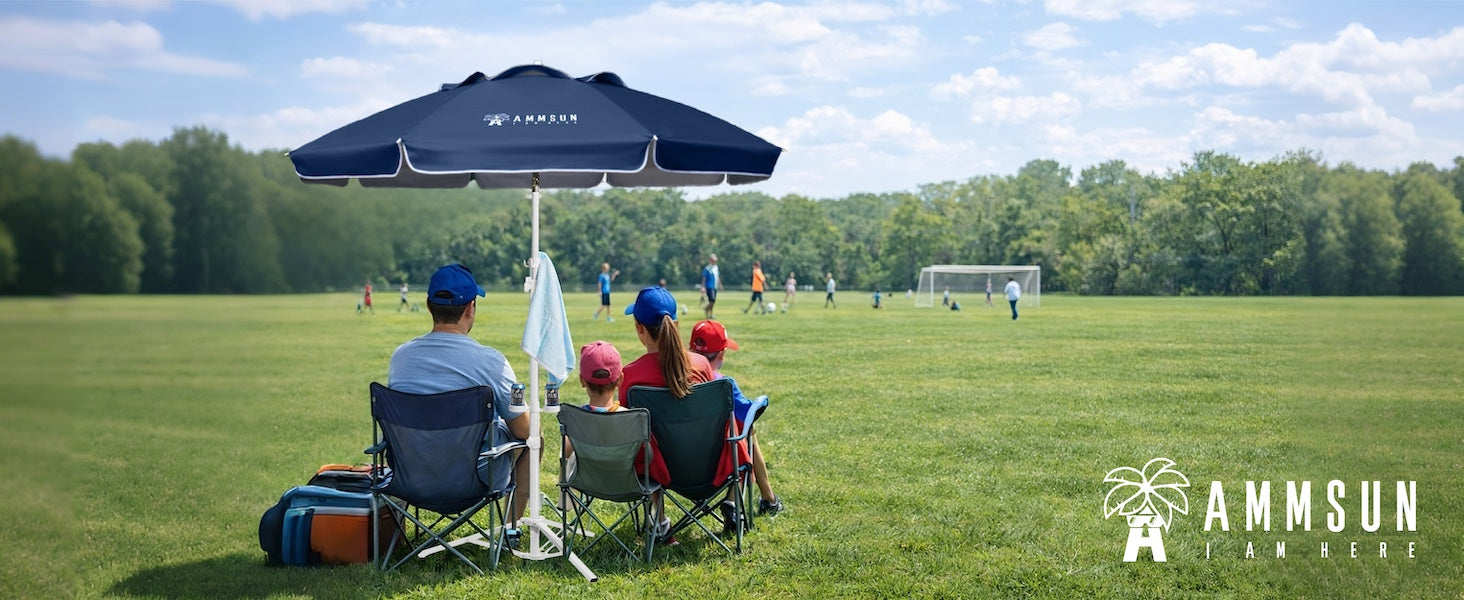 A family sitting under AMMSUN 6.5ft dark blue portable beach umbrella for outdoor with stand