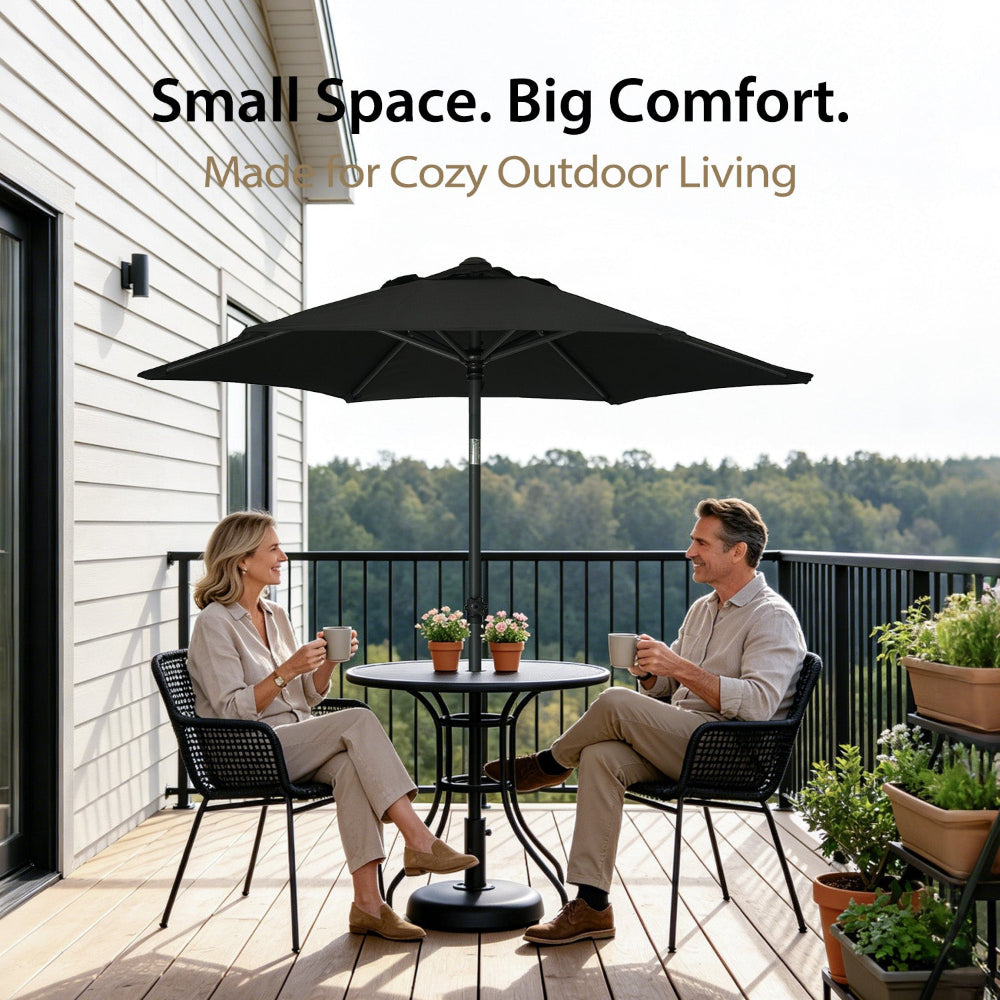 Two people sitting on balcony with an AMMSUN 6ft black large outdoor umbrella for pool umbrellas patio