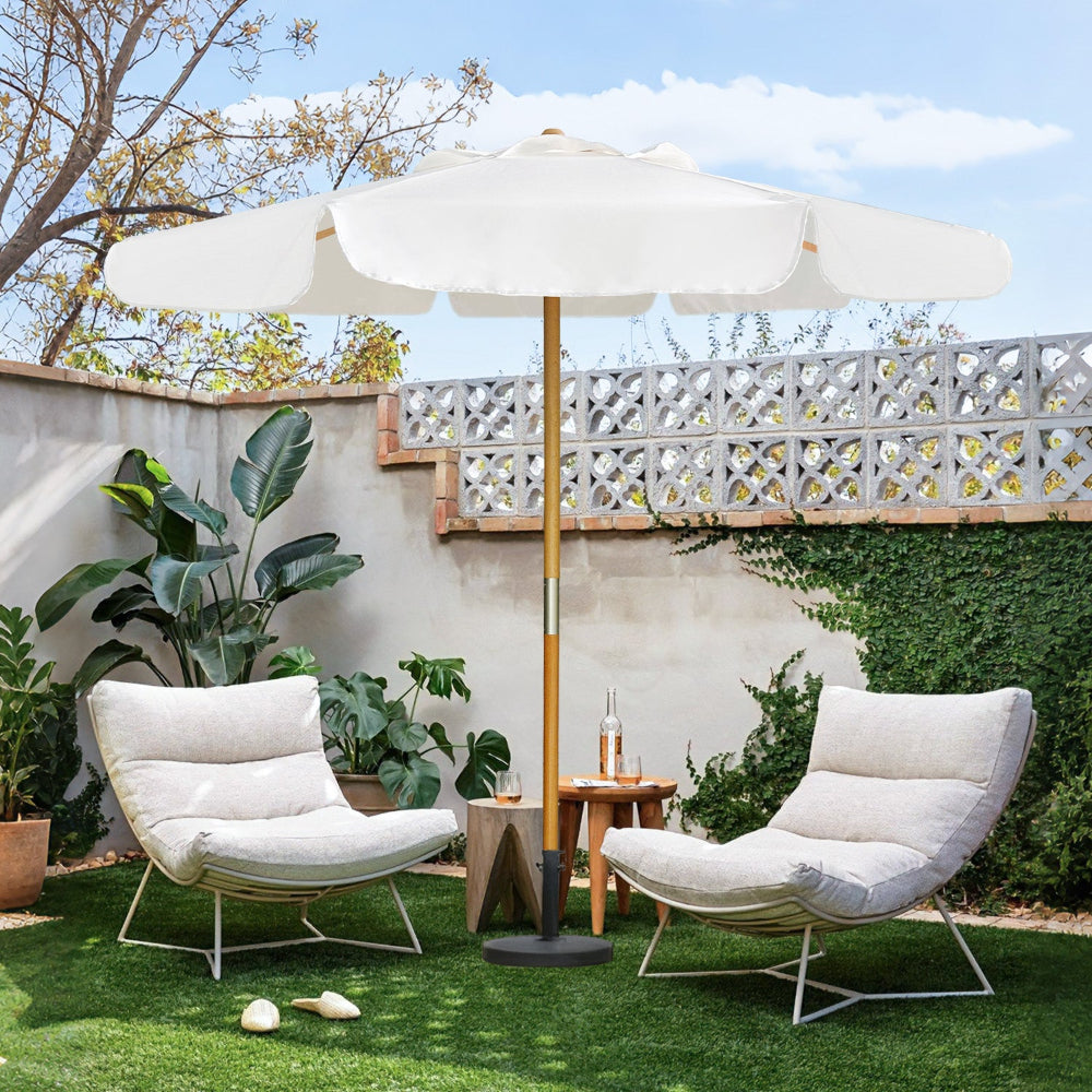 AMMSUN white large beach umbrella for outdoor patio shades two chairs in a backyard.