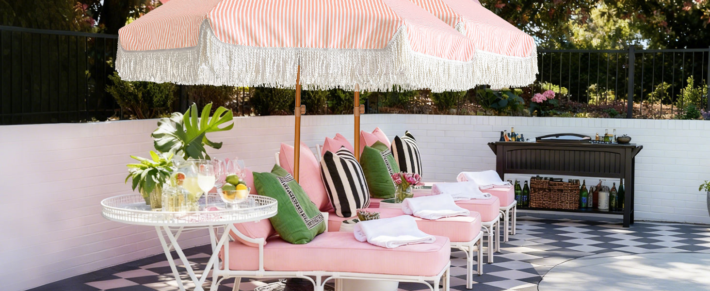 A patio with pink chairs and AMMSUN pink umbrella outdoor patio with fringe
