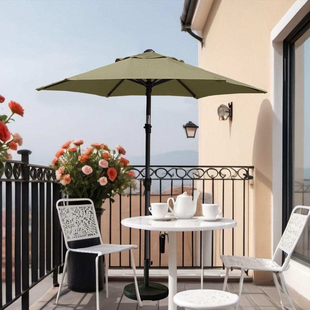A chic balcony arrangement with a table and chairs under AMMSUN 6ft beige best choice patio umbrella