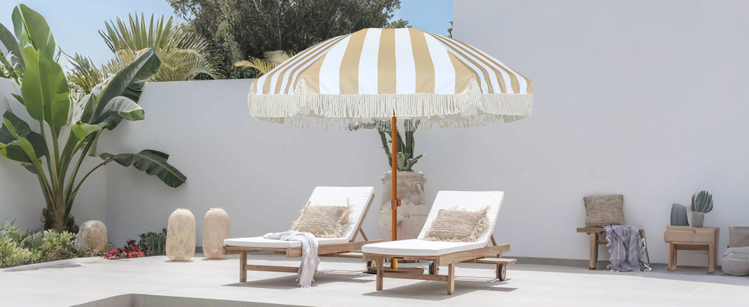 A poolside with chairs and AMMSUN beige stripes boho umbrella with fringe for outdoor patio