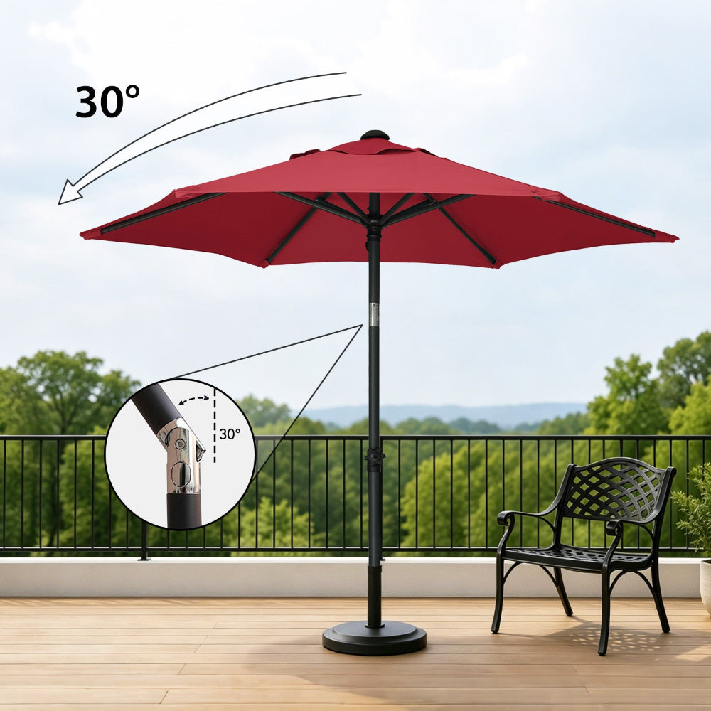 AMMSUN 6ft red patio table umbrella with base for parasol umbrella included tilted at 30° is placed on the balcony