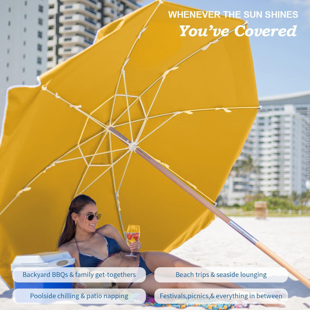 Woman under a large AMMSUN 7.5ft commercial grade yellow stripes best beach umbrella