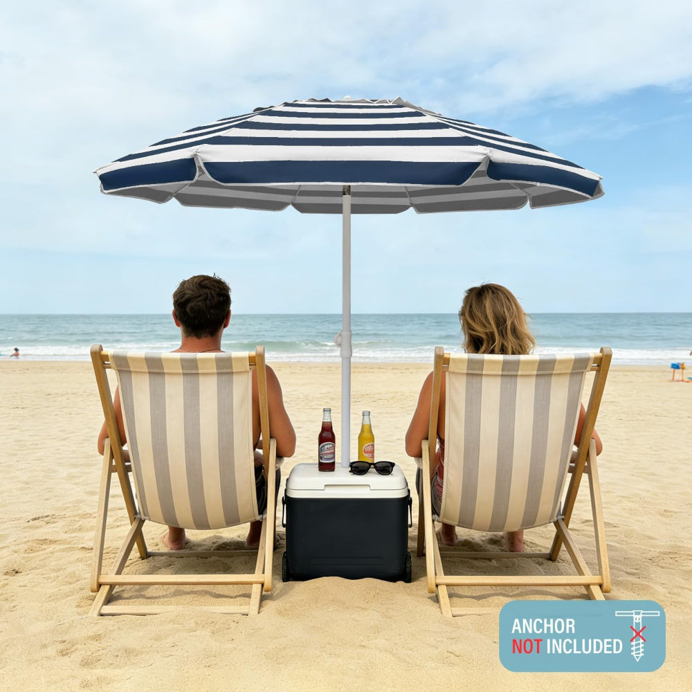 Two people sitting under an AMMSUN 6.5ft dark blue striped patio umbrella small wind resistant umbrella stands on beach