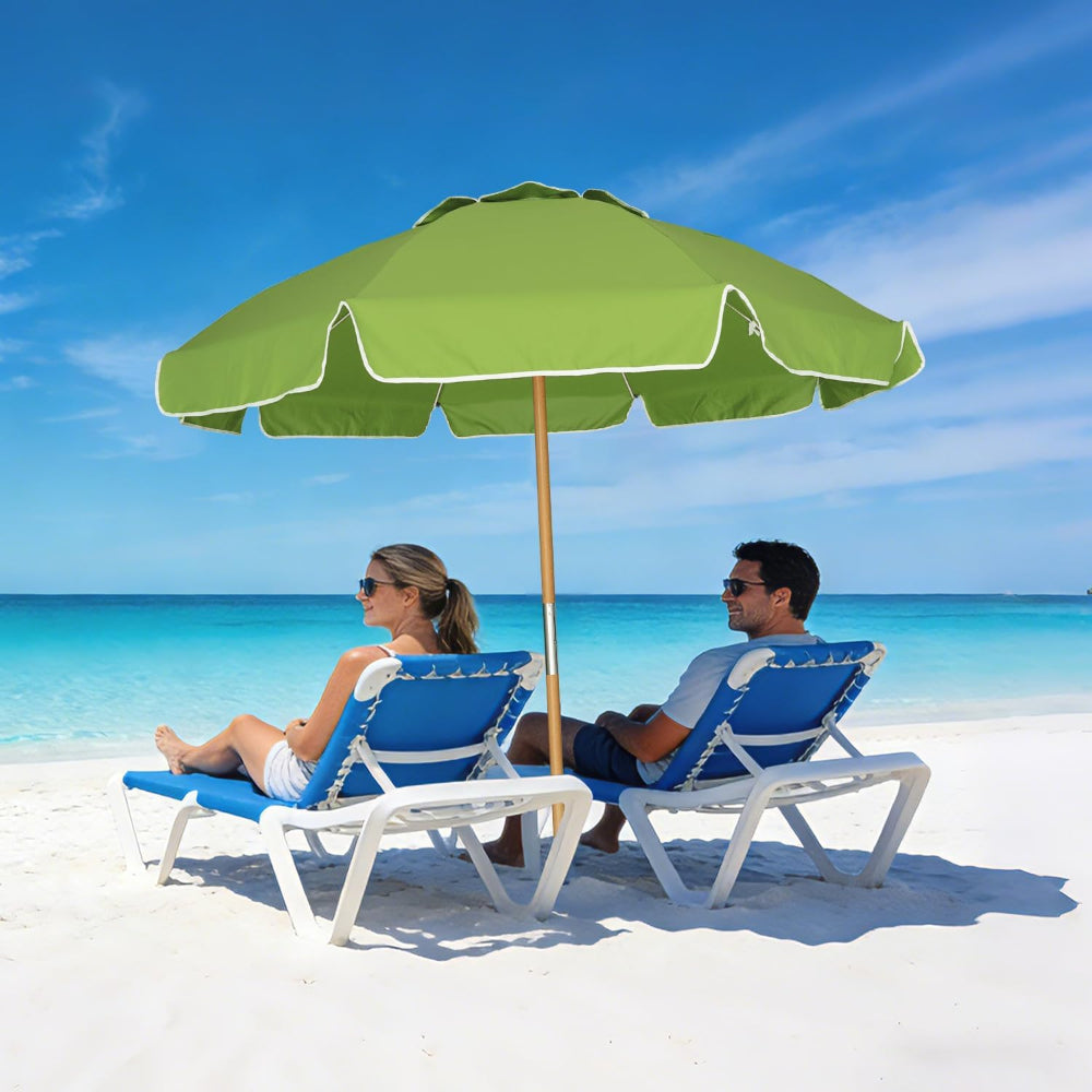 Two people sitting under a AMMSUN 7.5ft commercial grade green best beach umbrella at the beach.