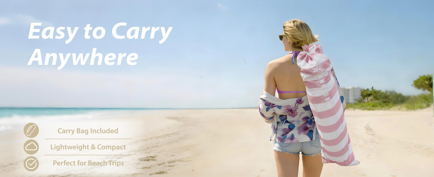 A woman carrying an AMMSUN 8'x8' lightweight portable beach cabana tent folded in bag in 39.76inches length 
