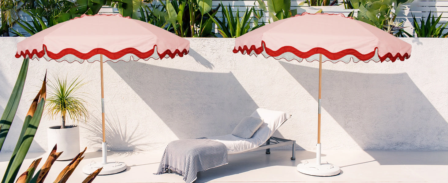 Two AMMSUN 7.8ft deep peach vintage patio umbrella with wood pole providing shade and a pop of color to the outdoor space.