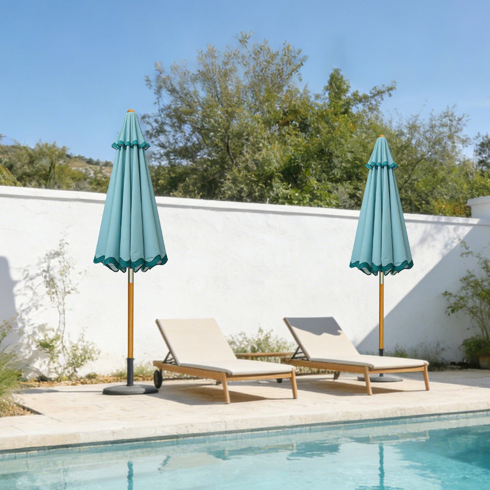 Two lounge chairs with AMMSUN Turquoise market umbrella outdoor patio with pulley lift by a poolside.