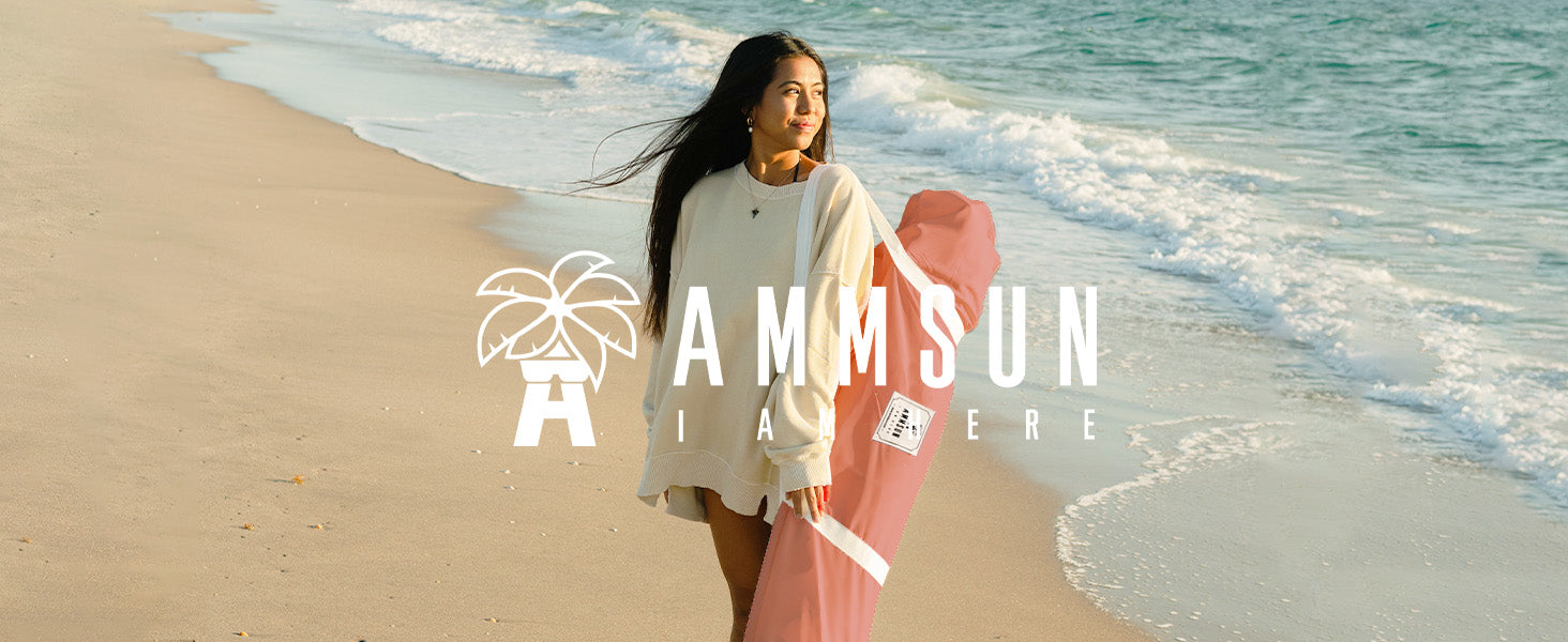 A woman holding carry bag for AMMSUN 7ftx7ft vintage pink fringe beach cabanas with tassel
