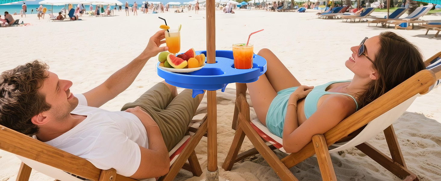 Two people lying under an umbrella with AMMSUN 13