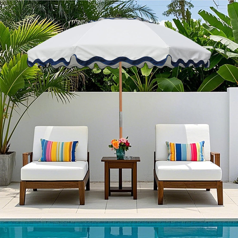 Two lounge chairs with AMMSUN 7.8ft seashore umbrella, outdoor umbrella and a table beside a pool