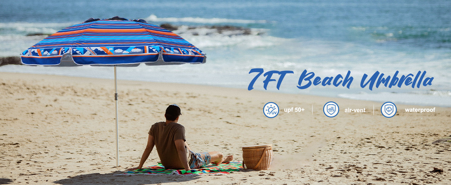 A man relaxes on the beach, seated under AMMSUN blue orange 7ft portable beach umbrella for outdoor with sand anchor