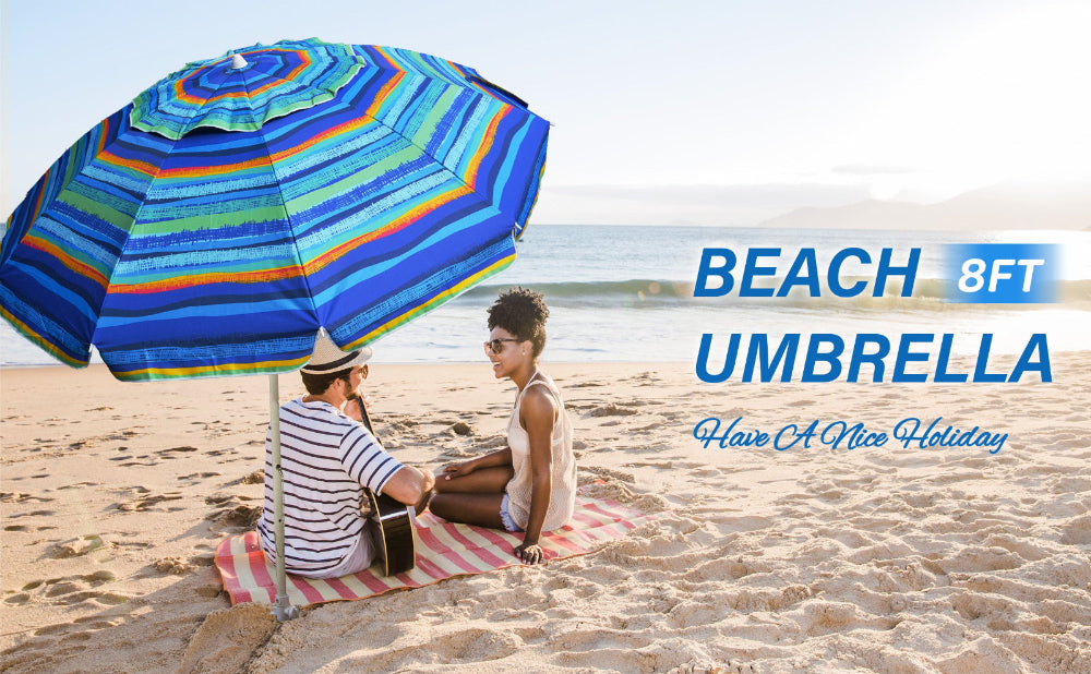 A couple enjoys a serene moment under AMMSUN 8ft green stripes portable umbrella with sand anchor on beach