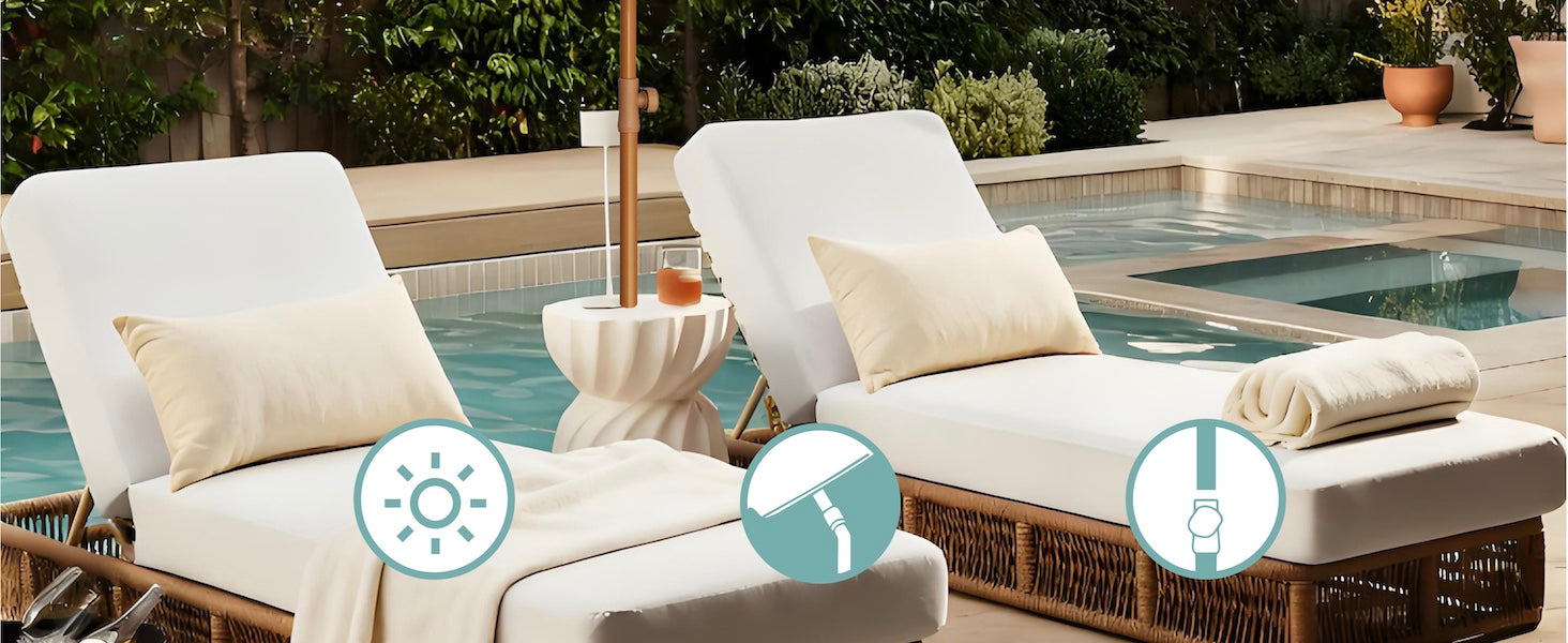 Two white lounge chairs by a pool with decorative elements.