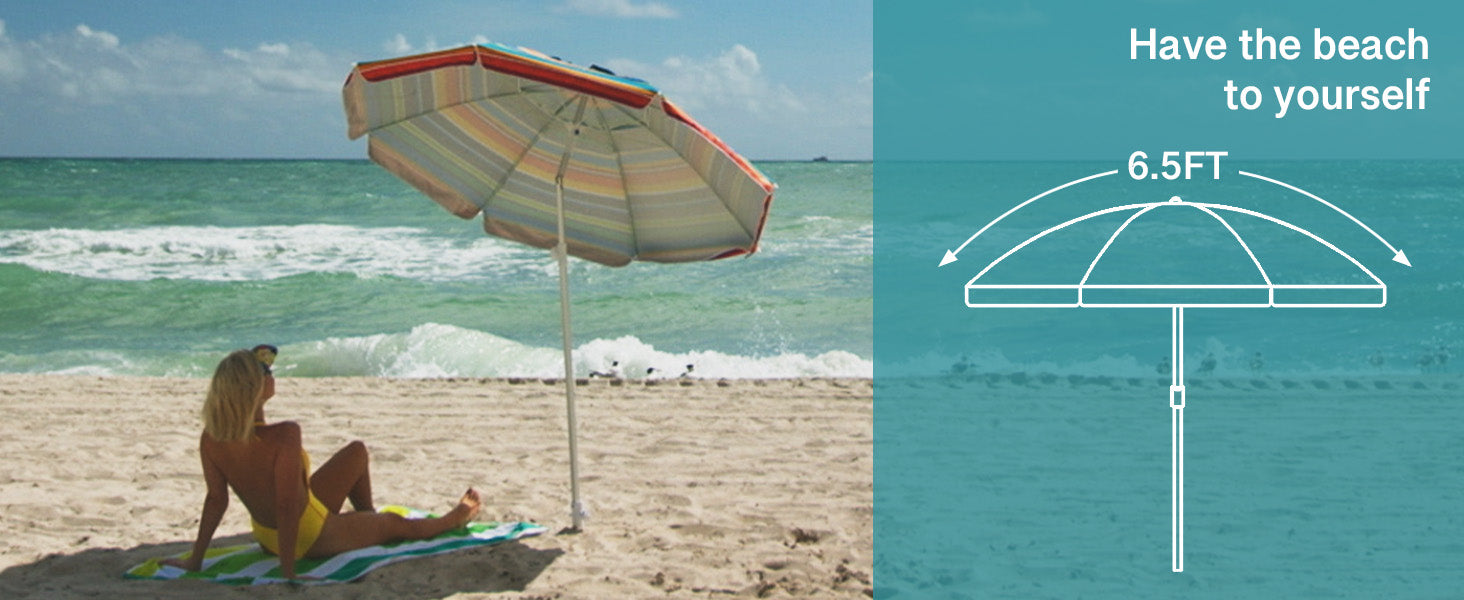 A woman sitting under AMMSUN silence blue 6.5ft wind resistant beach umbrella with sand anchor on the beach