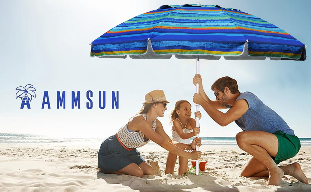 A cheerful family having fun with AMMSUN 8ft green stripes heavy duty beach umbrella with stand