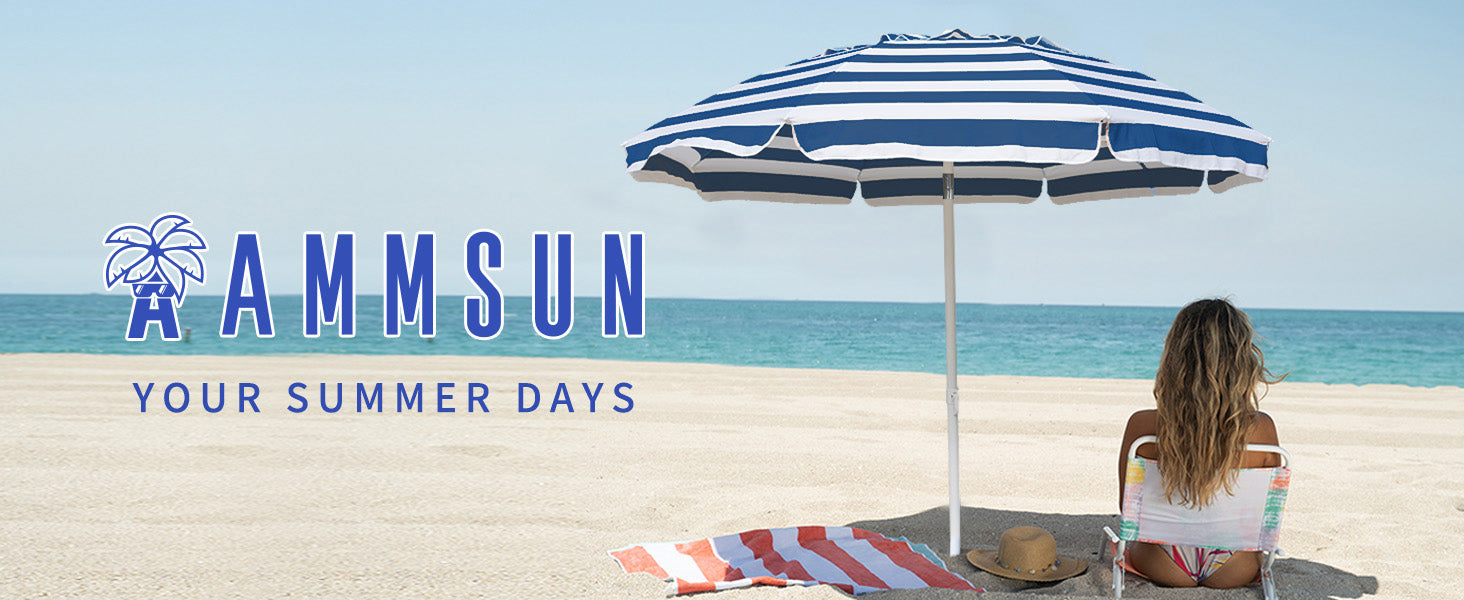 A woman sitting under AMMSUN 6.5ft blue strips sun umbrellas outdoor on beach