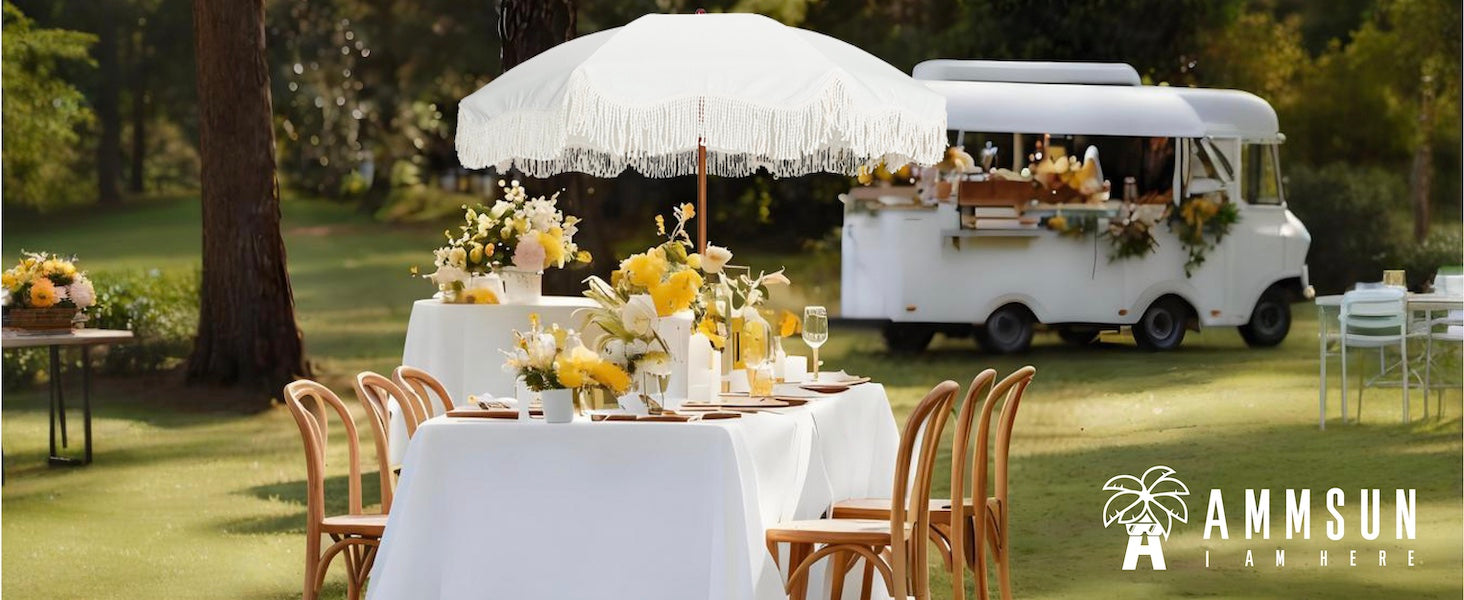 AMMSUN 6.5ft boho white fringe umbrella with tassel, tables, chairs, and a food truck in a park